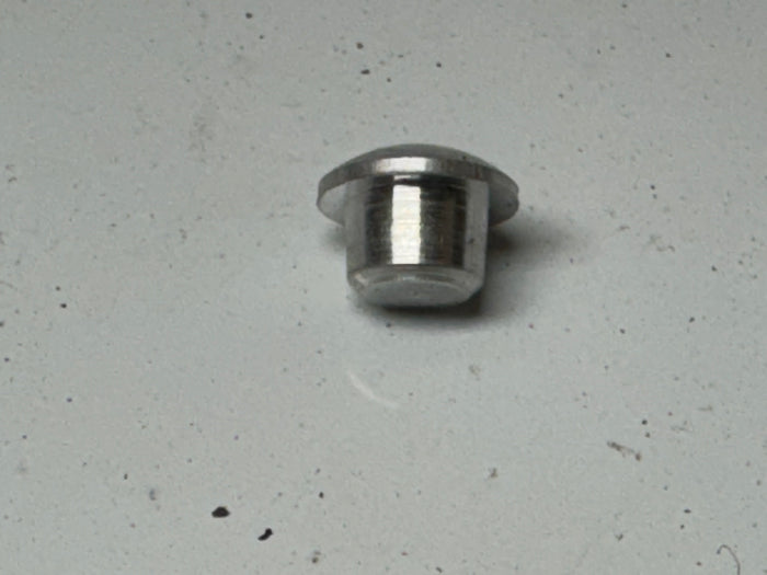 Idle Compensator passage plug