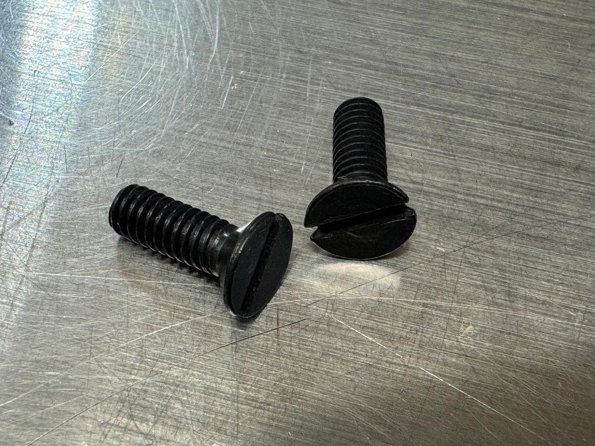 Screw,  short length flat head air horn to main body Black