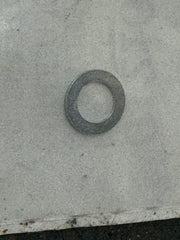 Pump shaft seal retainer